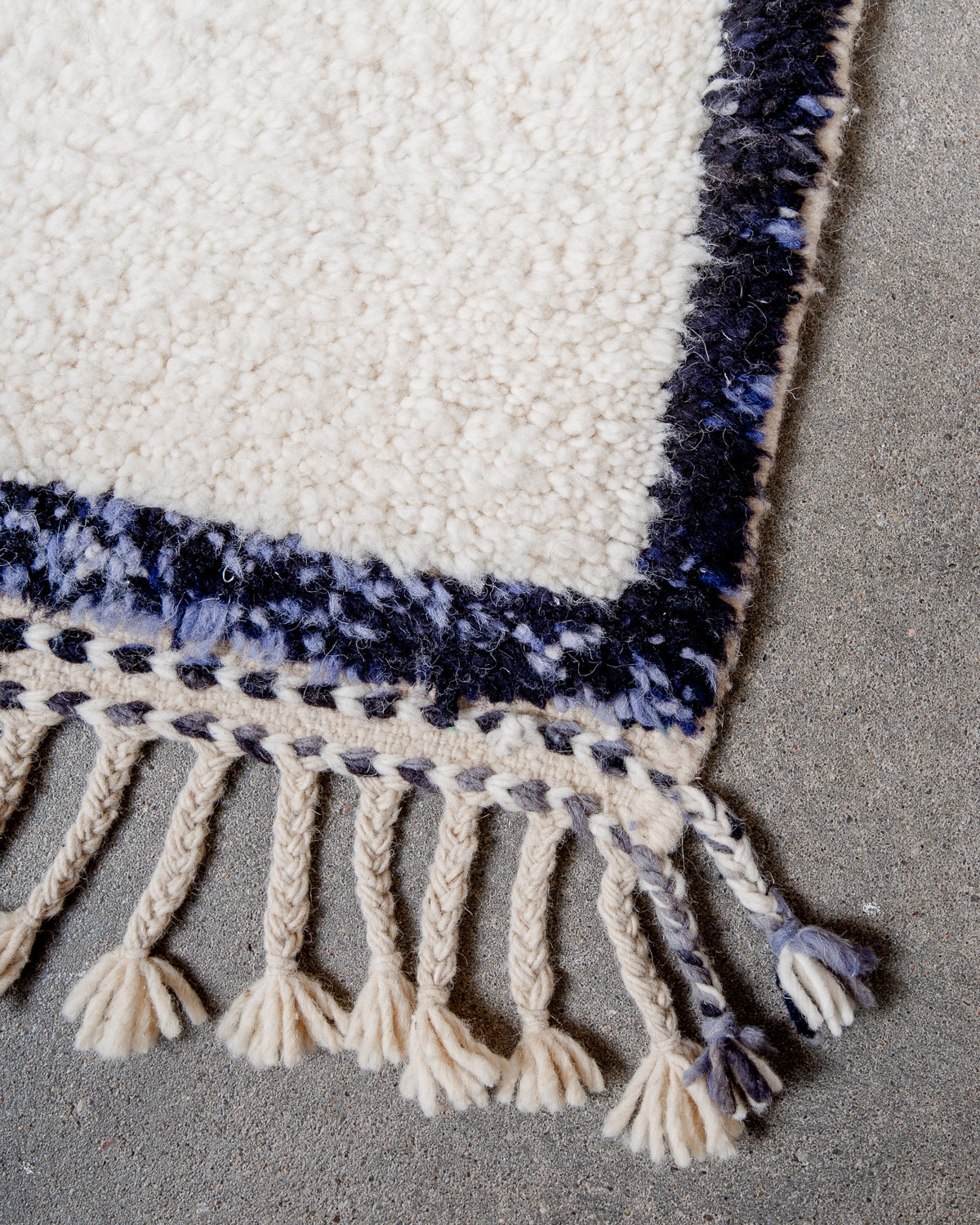 Modern, designer, handcrafted Berber rug from Morocco. Beniourain carpet with beautiful colours and patterns and fluffy wool texture.